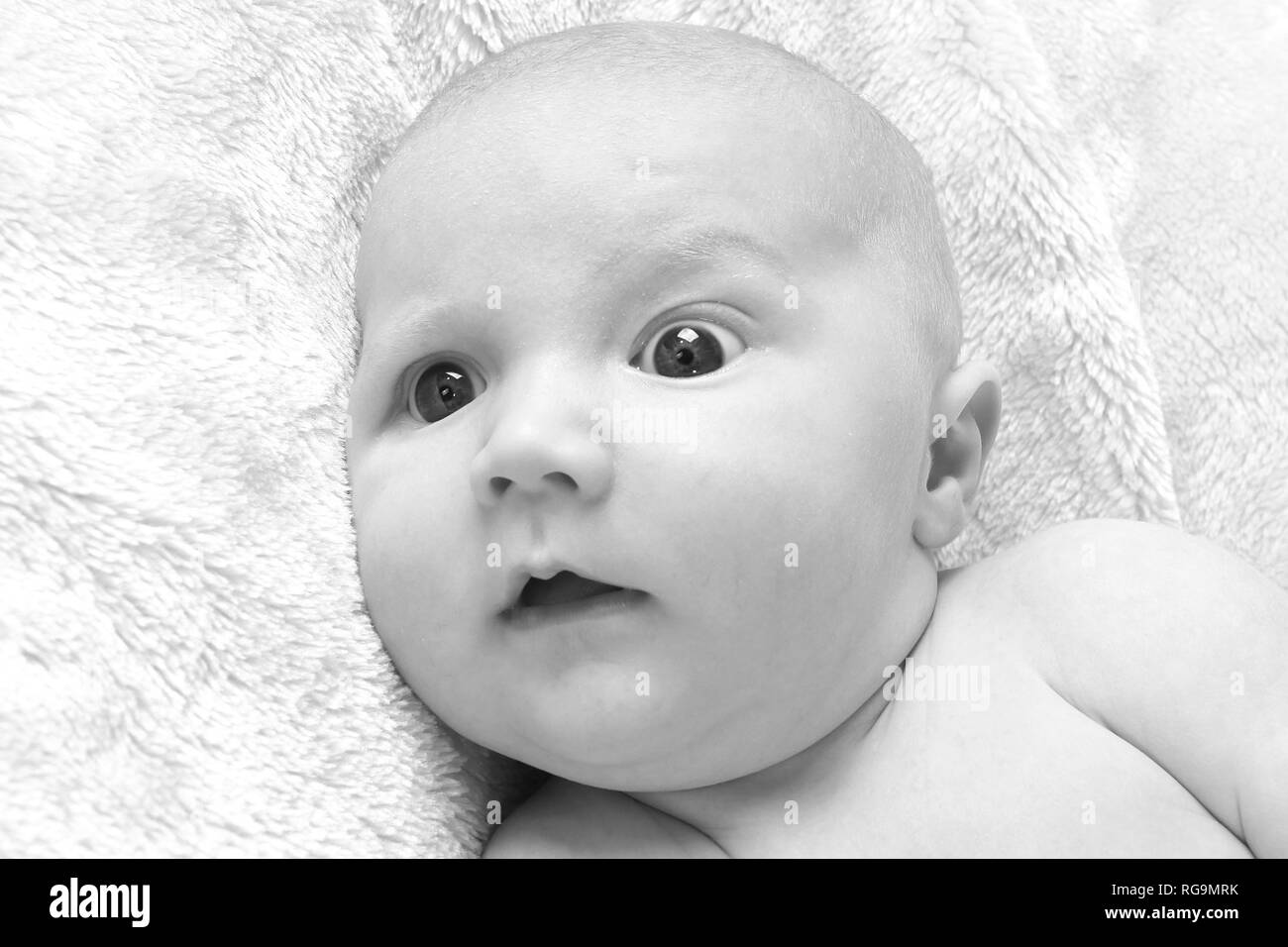 Happy baby boy relaxing Stock Photo Alamy