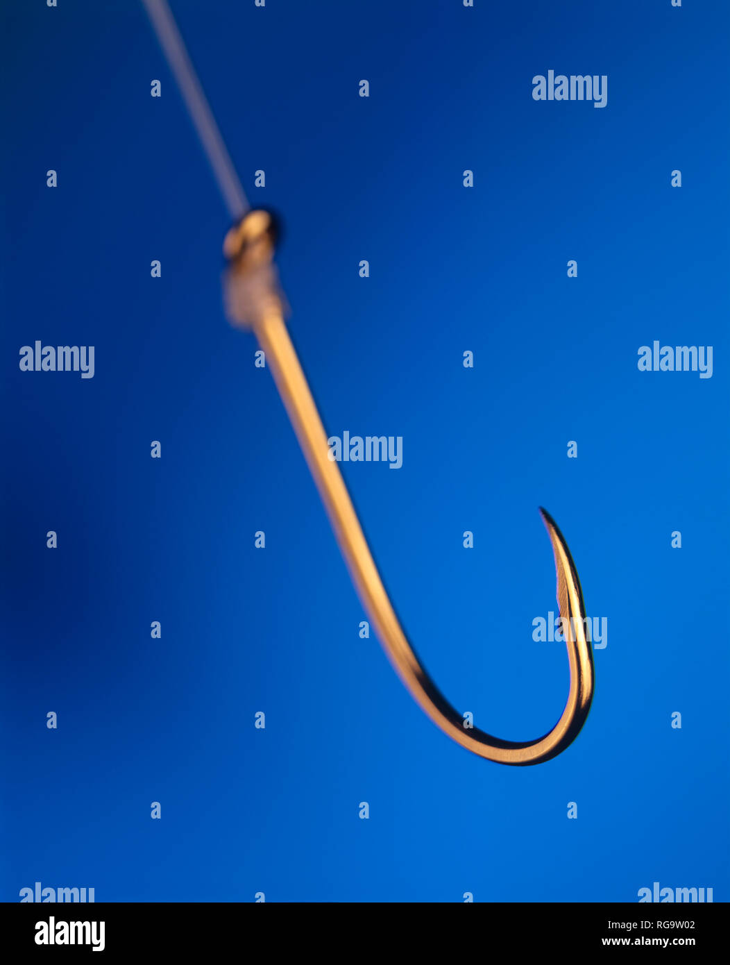 Golden fishhook Cut Out Stock Images & Pictures - Alamy