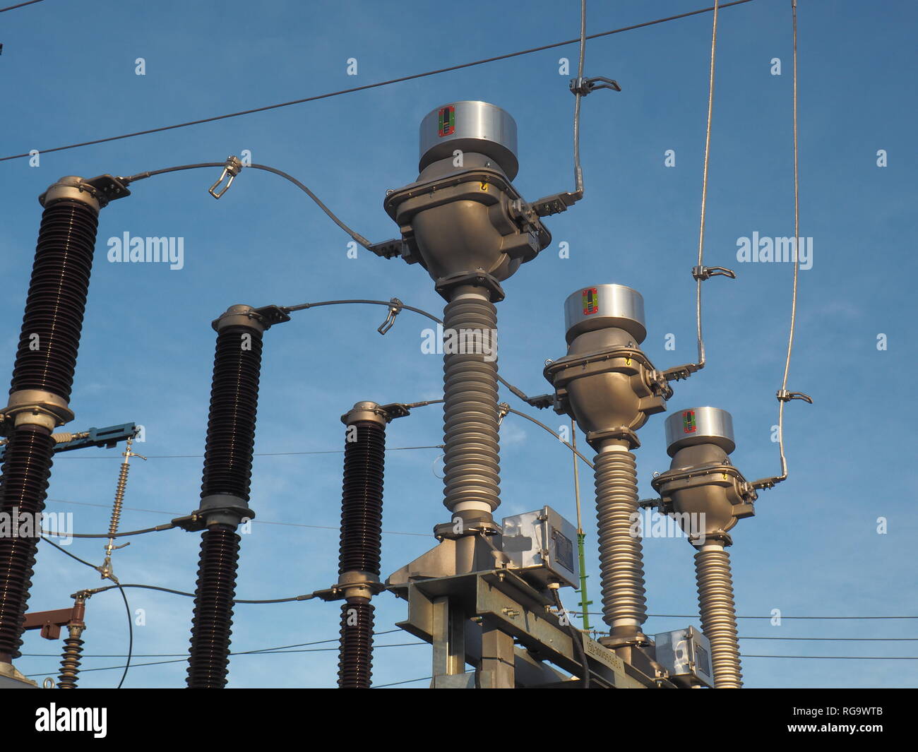 High voltage current transformers and circuit breaker at blue sky background Stock Photo Alamy