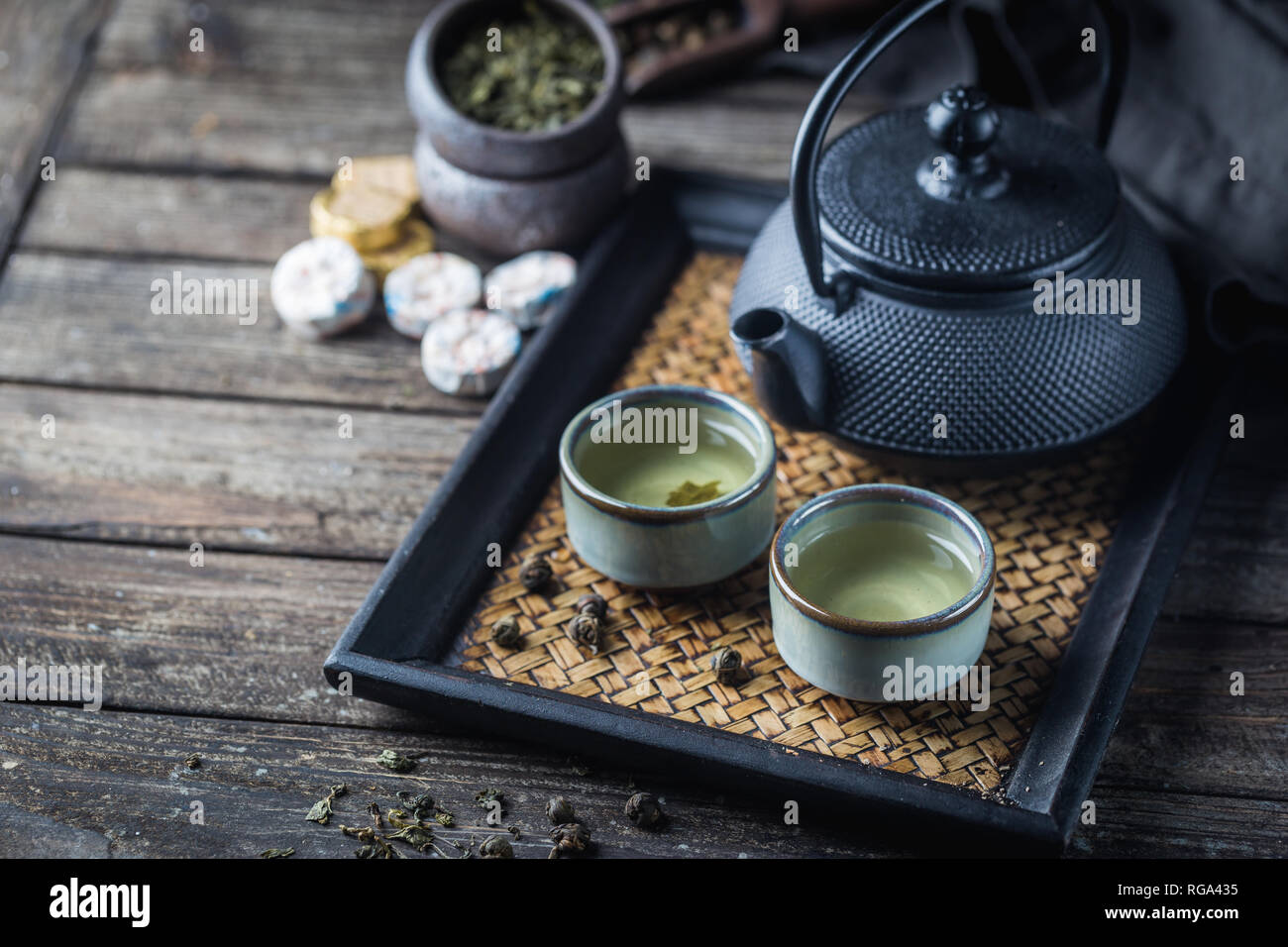 Stilllife of japanese healthy green tea in a small cups and teapot