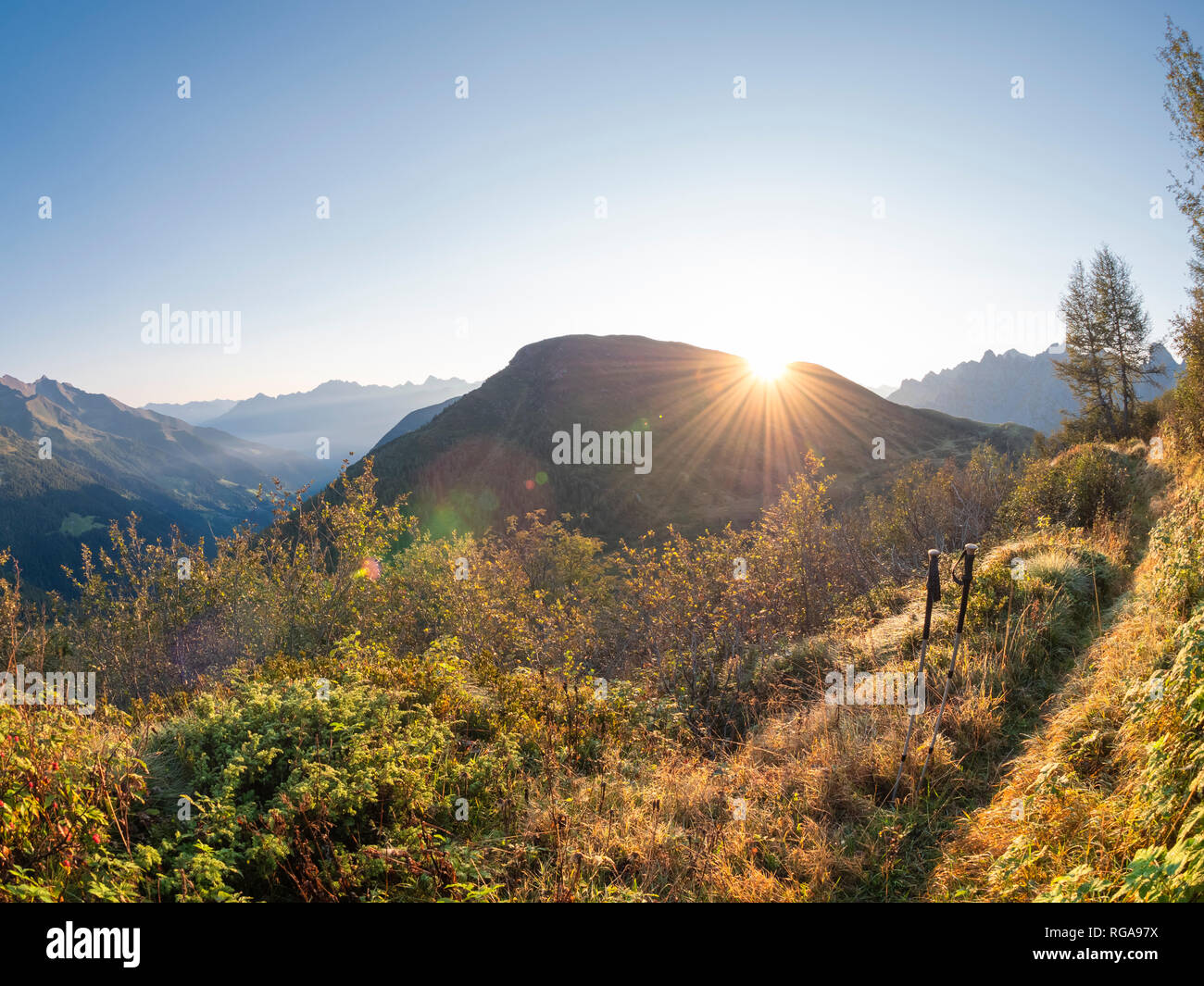 Italy, Lombardy, Bergamasque Alps, hiking trail to Monte Gardena, Cima Bagozza against the sun Stock Photo