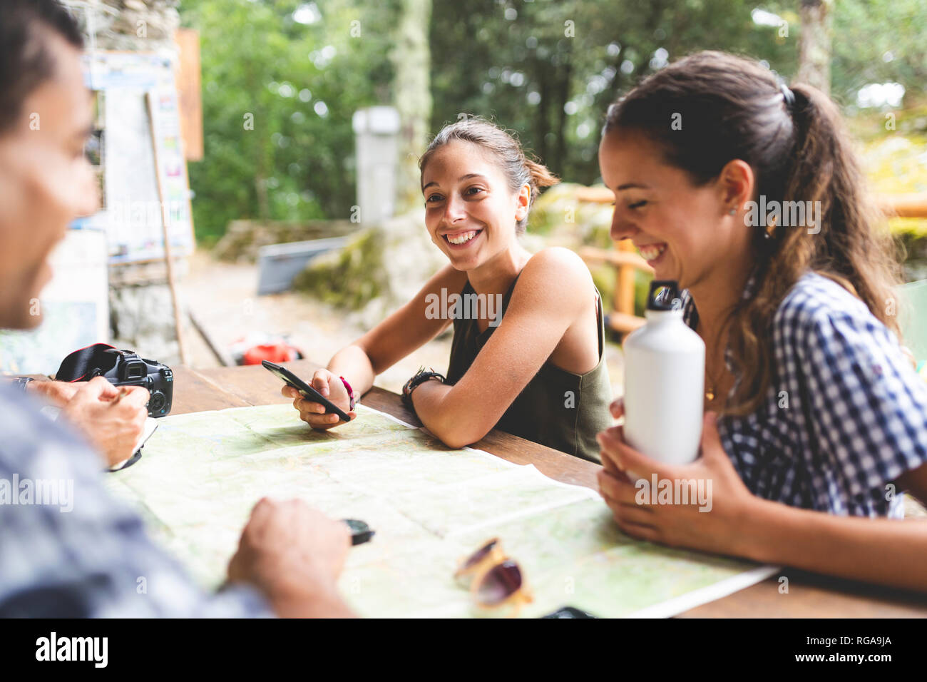 Hikers planning trip map hi-res stock photography and images - Alamy