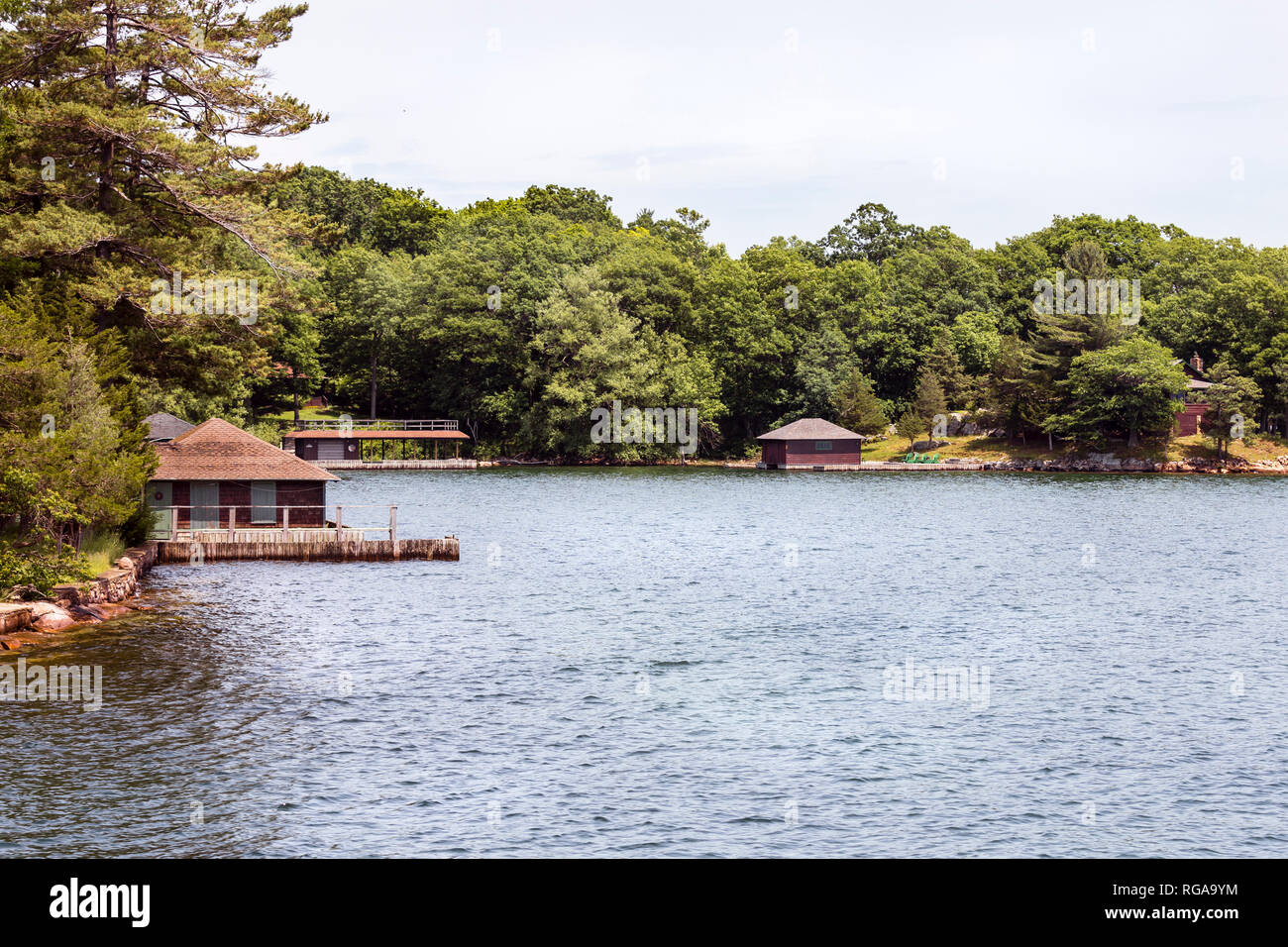 Thousand Islands National Park, Saint Lawrence River, Ontario, Canada, June 17, 2018: One of the many beautiful cottages on the Archipelago in summer Stock Photo