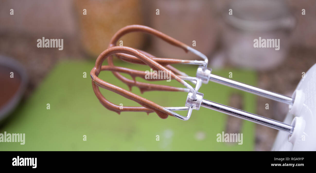 Licking the cake beaters hires stock photography and images Alamy