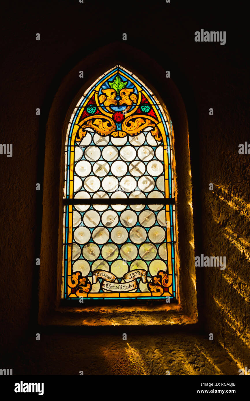 Stained glass window in church in Heiligenblut Stock Photo