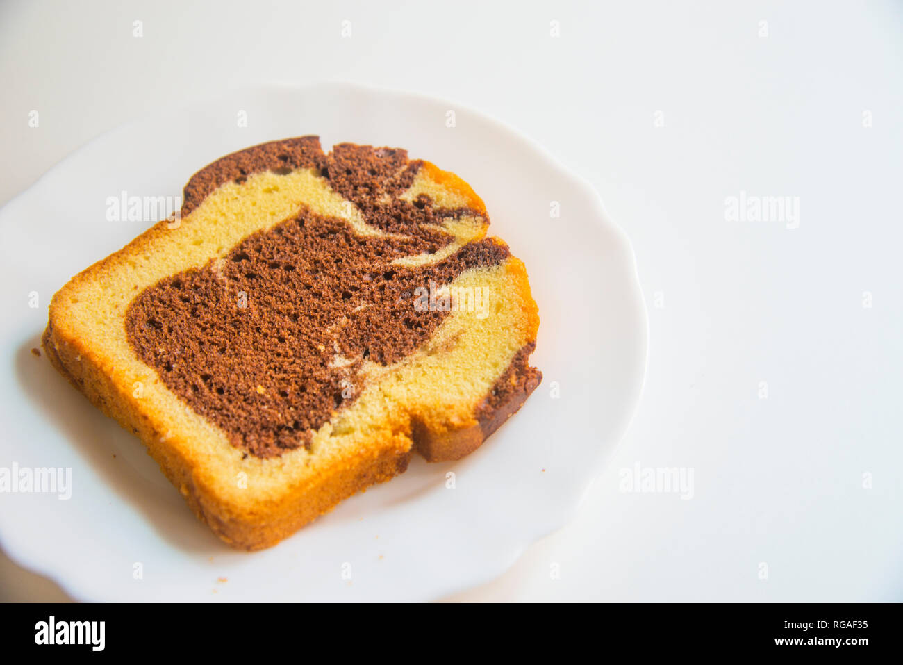 Piece of cake in a dish. Stock Photo