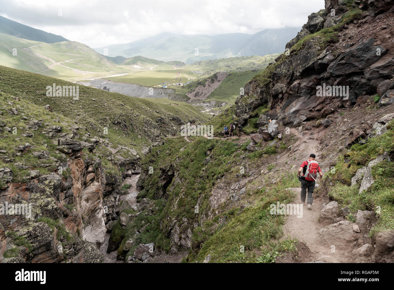 Russia, Caucasus, Mountaineers hiking in Upper Baksan Valley Stock Photo