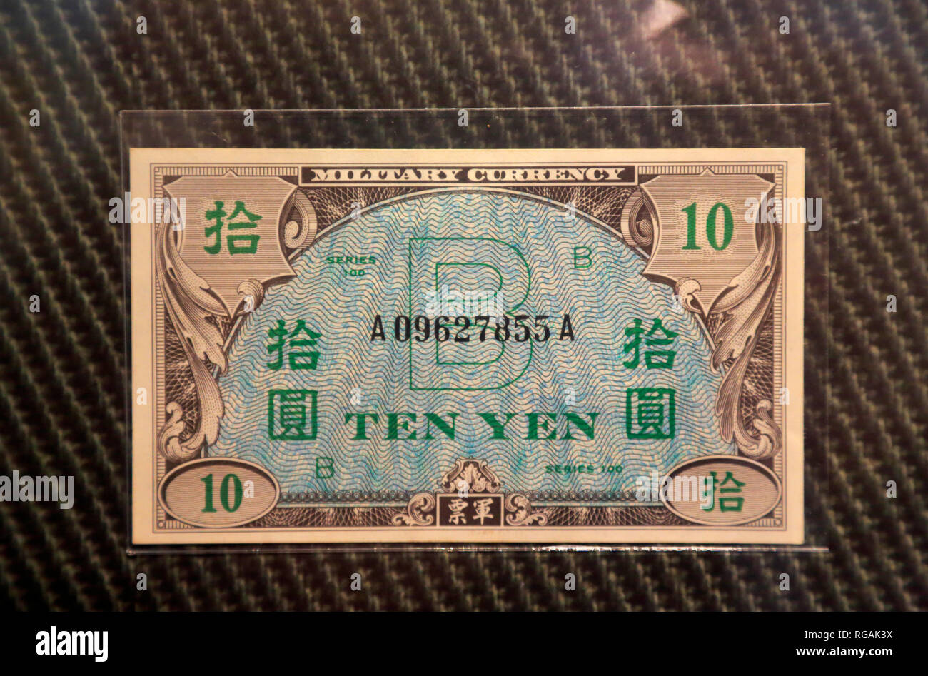 A 10 Yen military currency issued by Empire of Japan during World War II display at Money Museum in Federal Reserve Bank of Chicago. Illinois.USA Stock Photo