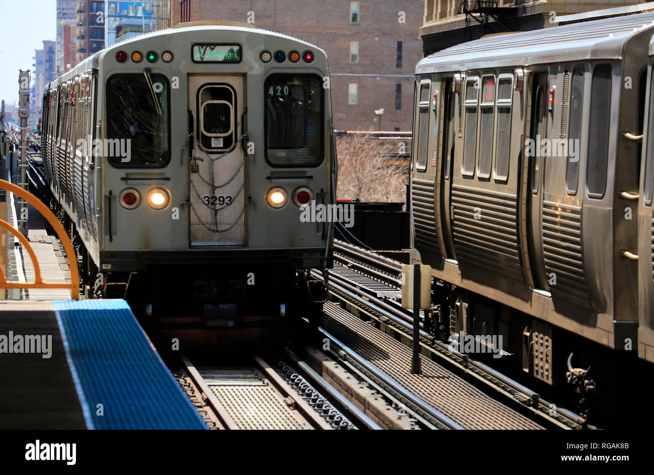 Chicago "L" trains running on elevated railroad tracks in the Loop of