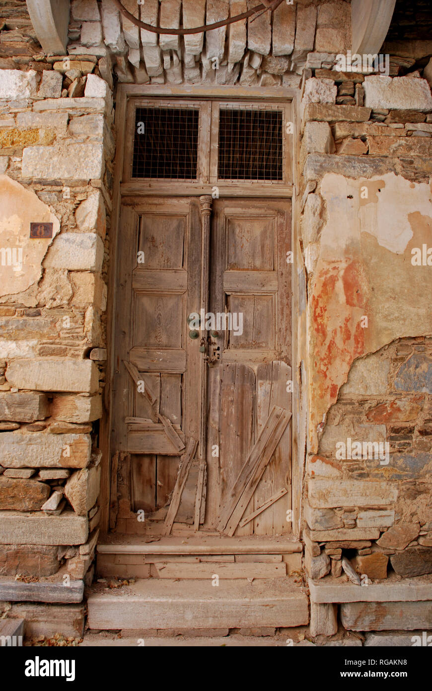Front door on hillside home on Syros, Greece Stock Photo