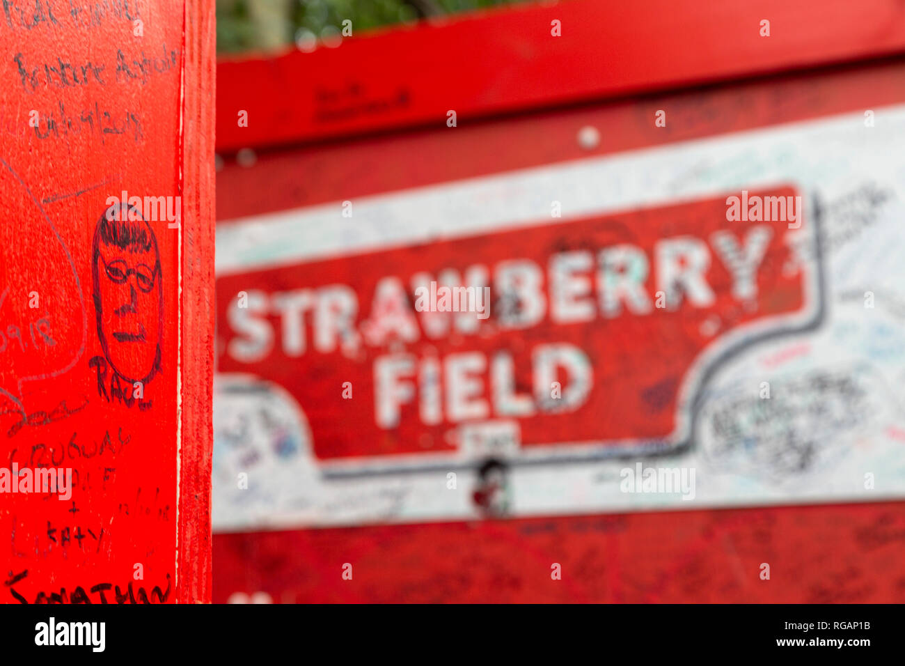 Graffiti at Strawberry Field n Liverpool, England. The location has become a place of pilgrimage to Beatles fans. Stock Photo