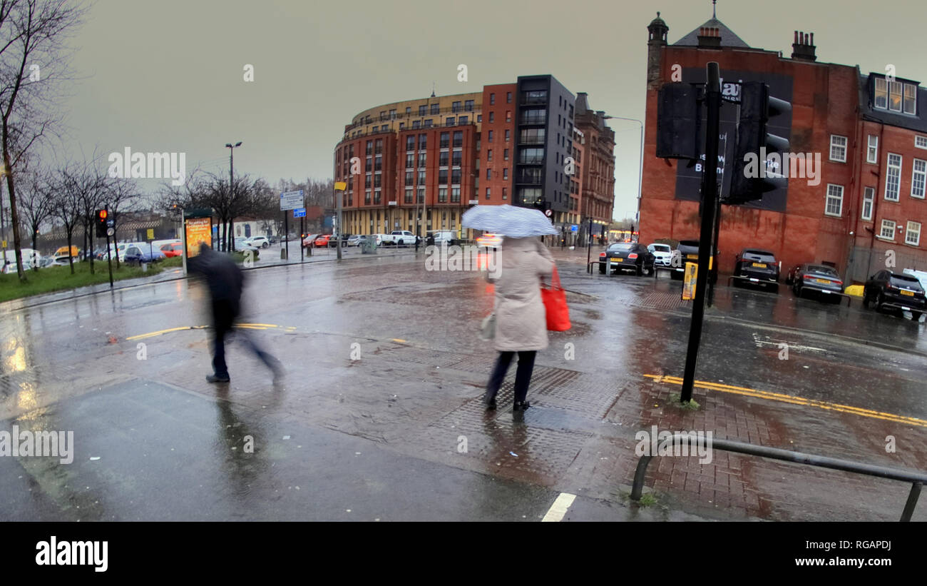 UK Weather: Rainy days locals and tourists enjoy their umbrellas. Glasgow, Scotland,UK Stock Photo