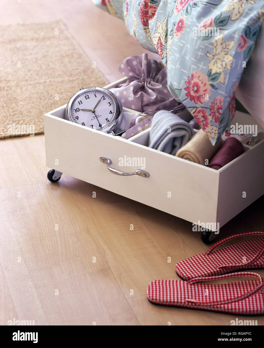 Pull Out Under Bed Storage Drawer On Casters Stock Photo