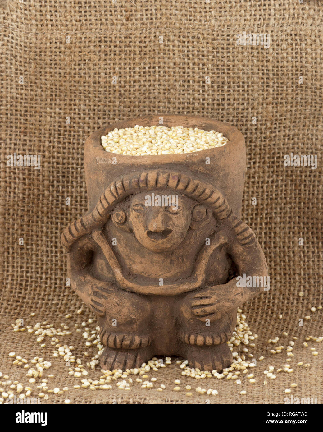 Organic golden Quinoa (Chenopodium quinoa) in Inca clay pot from Imbabura province of Northern Ecuador Stock Photo