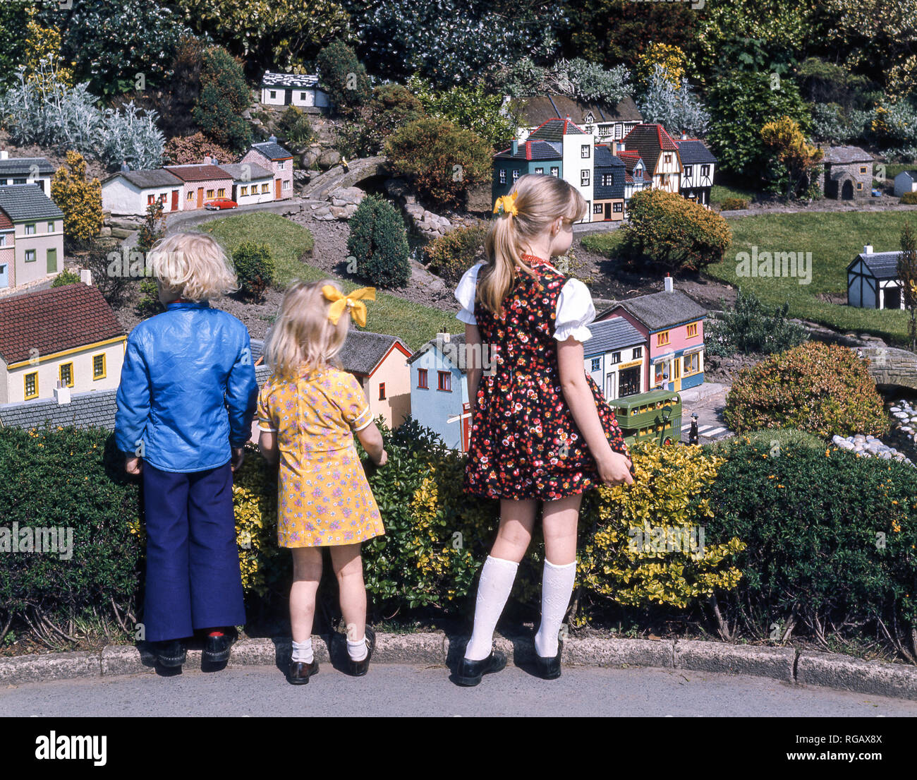 Three young children in the Southport miniature village. Stock Photo