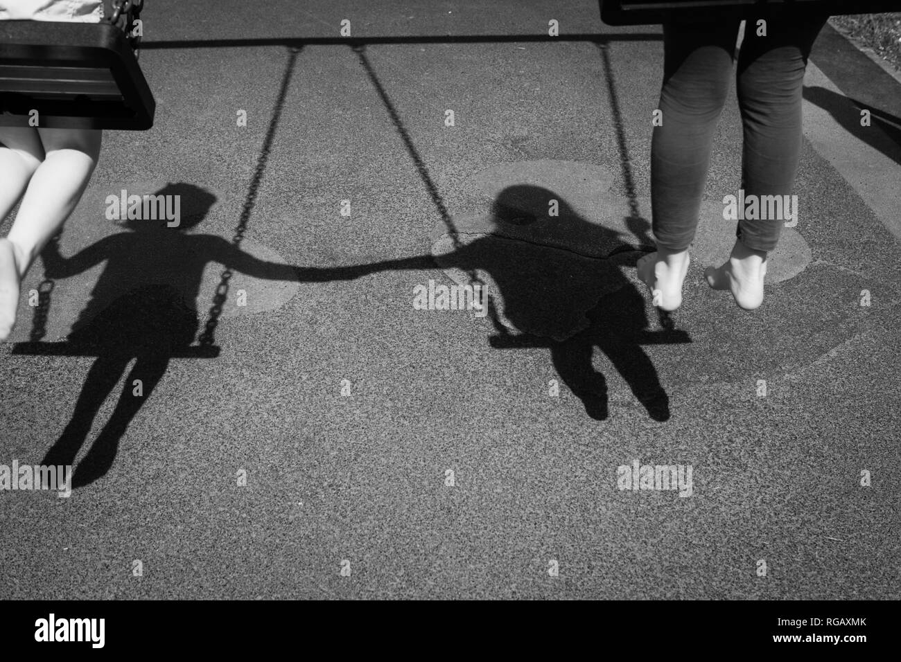 Two girls park rear view Black and White Stock Photos & Images - Alamy