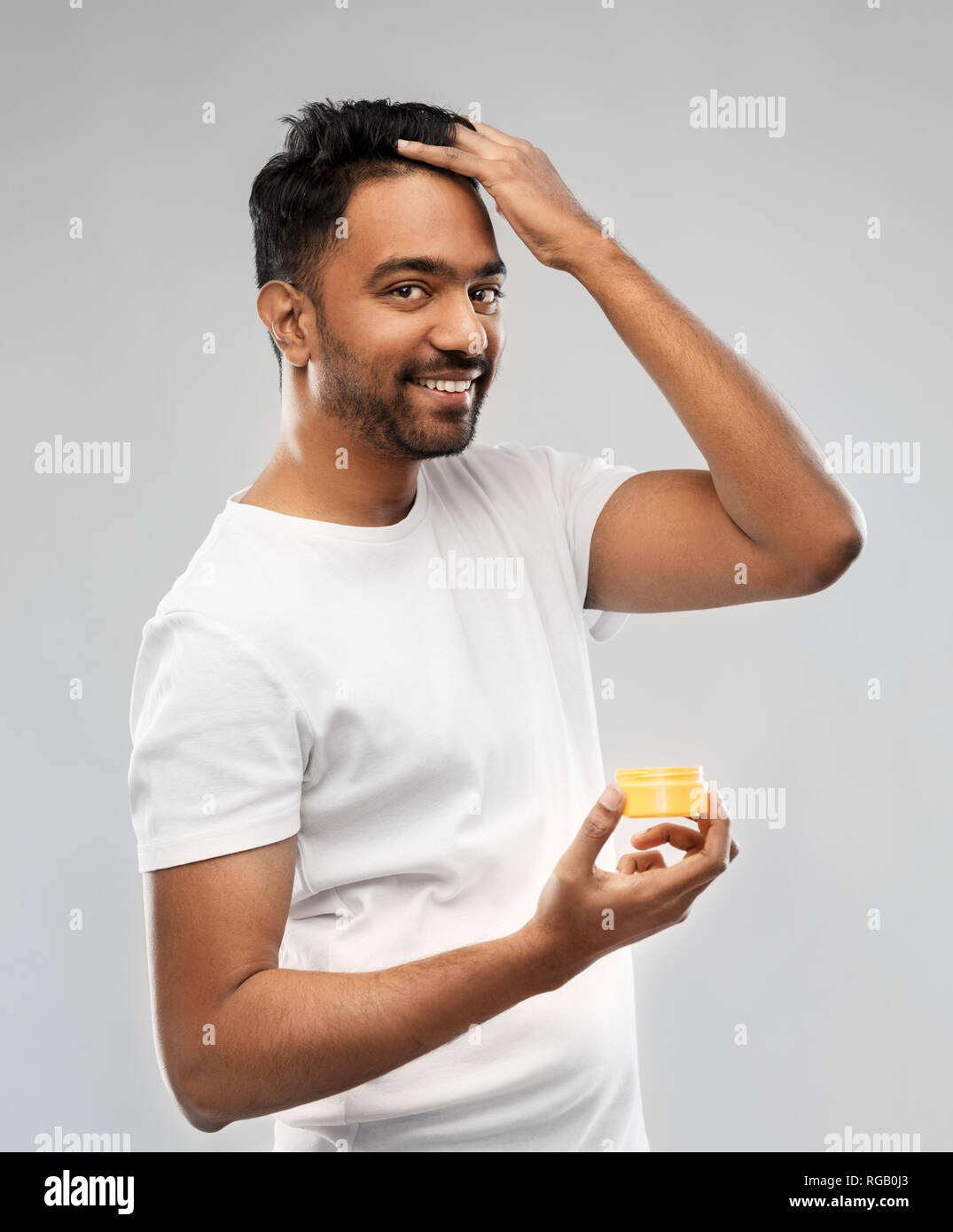 indian man applying hair wax or styling gel Stock Photo - Alamy indian man applying hair wax or styling gel Stock Photo - Alamy