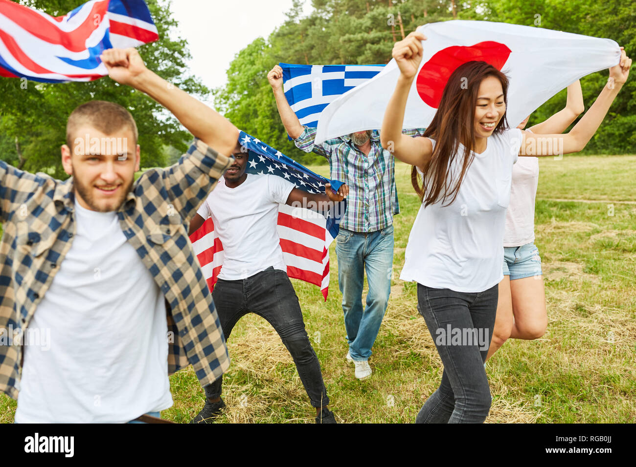 Group of students with national flags on an international youth exchange Stock Photo