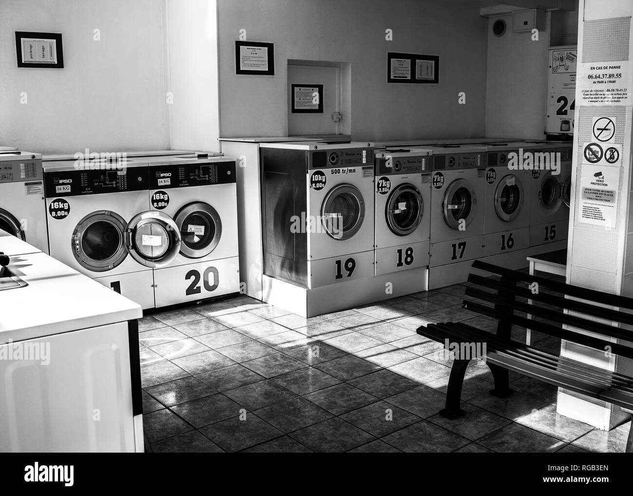 public laundromat empty interior Stock Photo