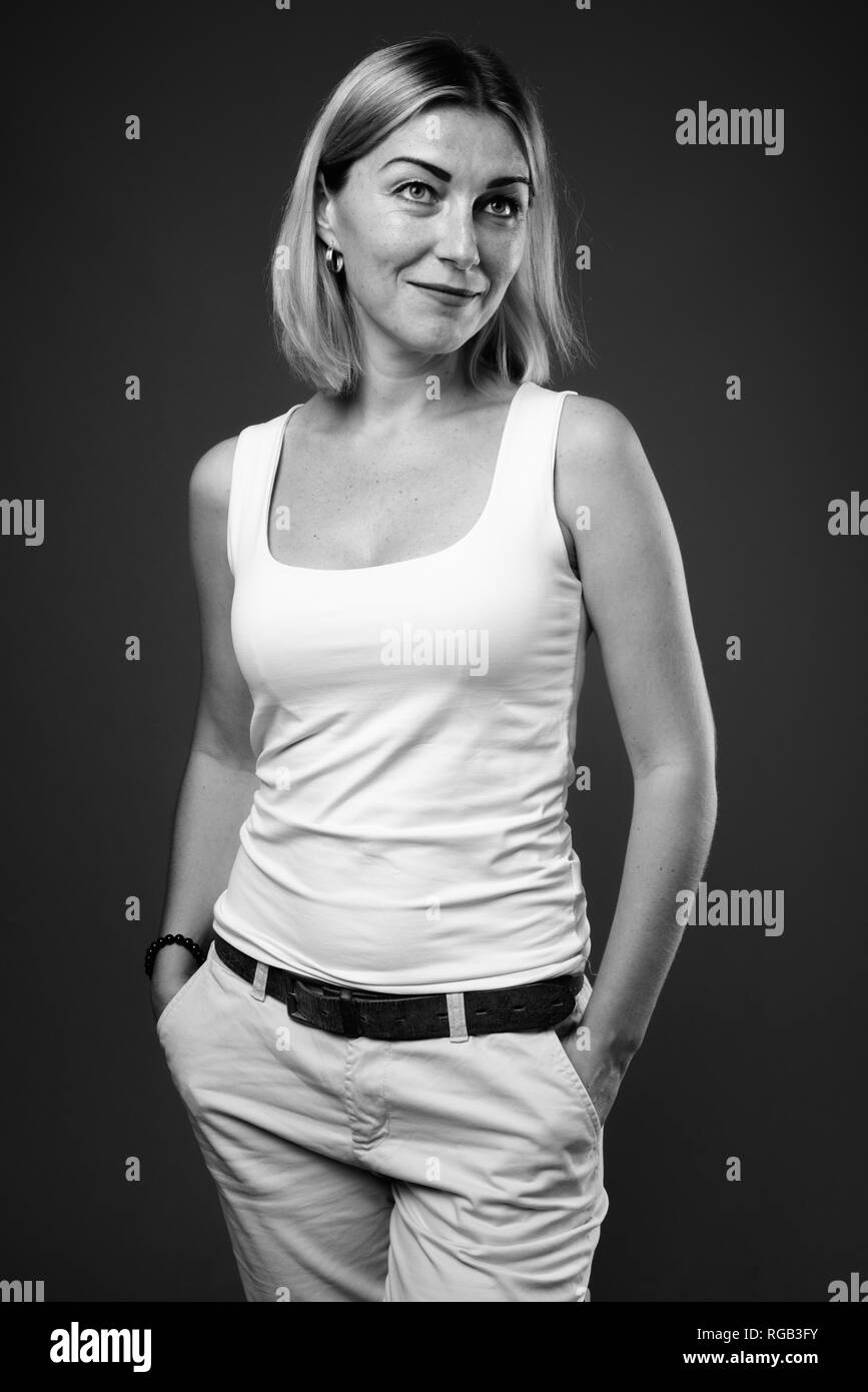 Beautiful businesswoman with short hair in black and white Stock Photo