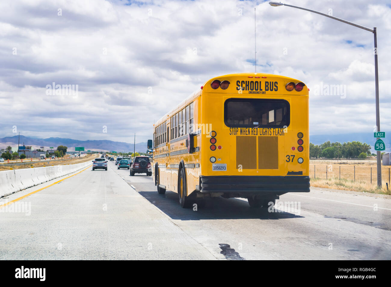May 25, 2018 Bakersfield / CA / USA - School Bus travelling on the highway Stock Photo