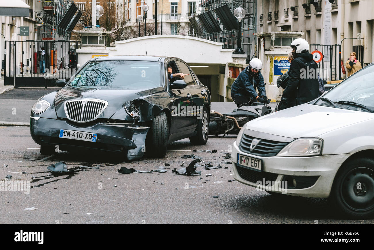 PARIS, FRANCE JAN 30, 2018 Car accident in Paris Lancia Thesis and