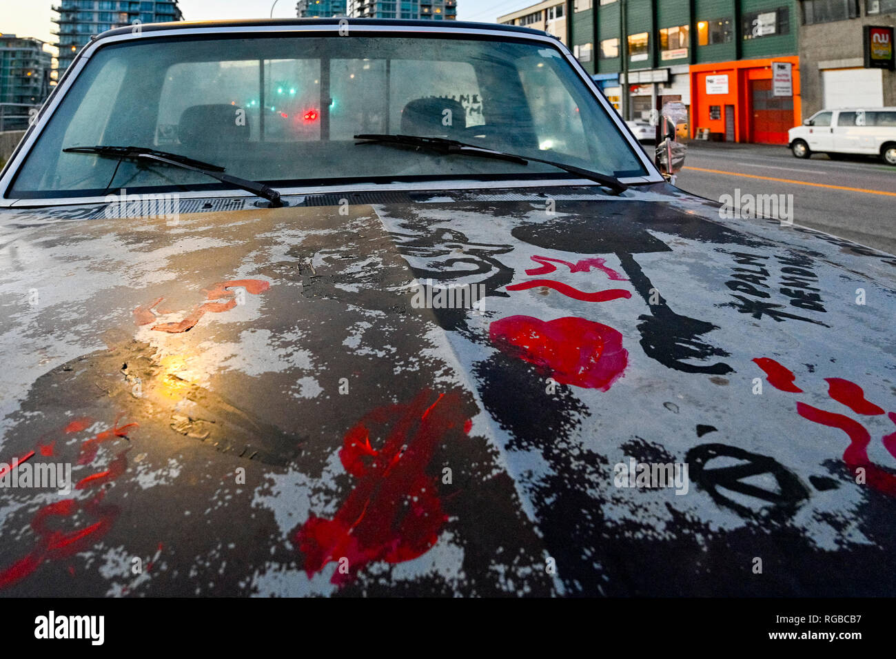 car with symbols painted on hood, bonnet Stock Photo