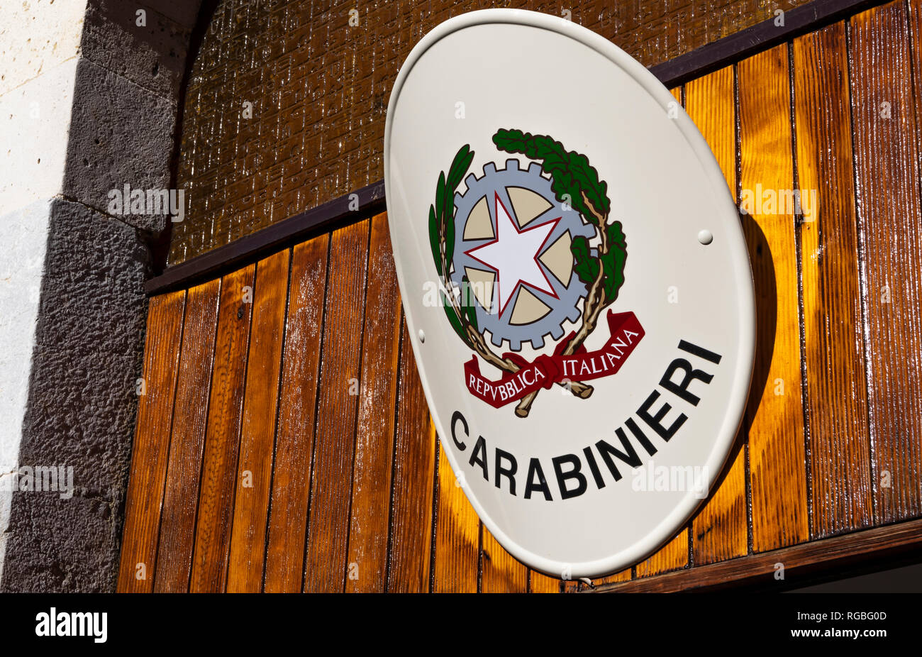 Taormina, Italy - January 16, 2019: Emblem of Italian police force Carabinieri, hanging over entrance to police station Stock Photo