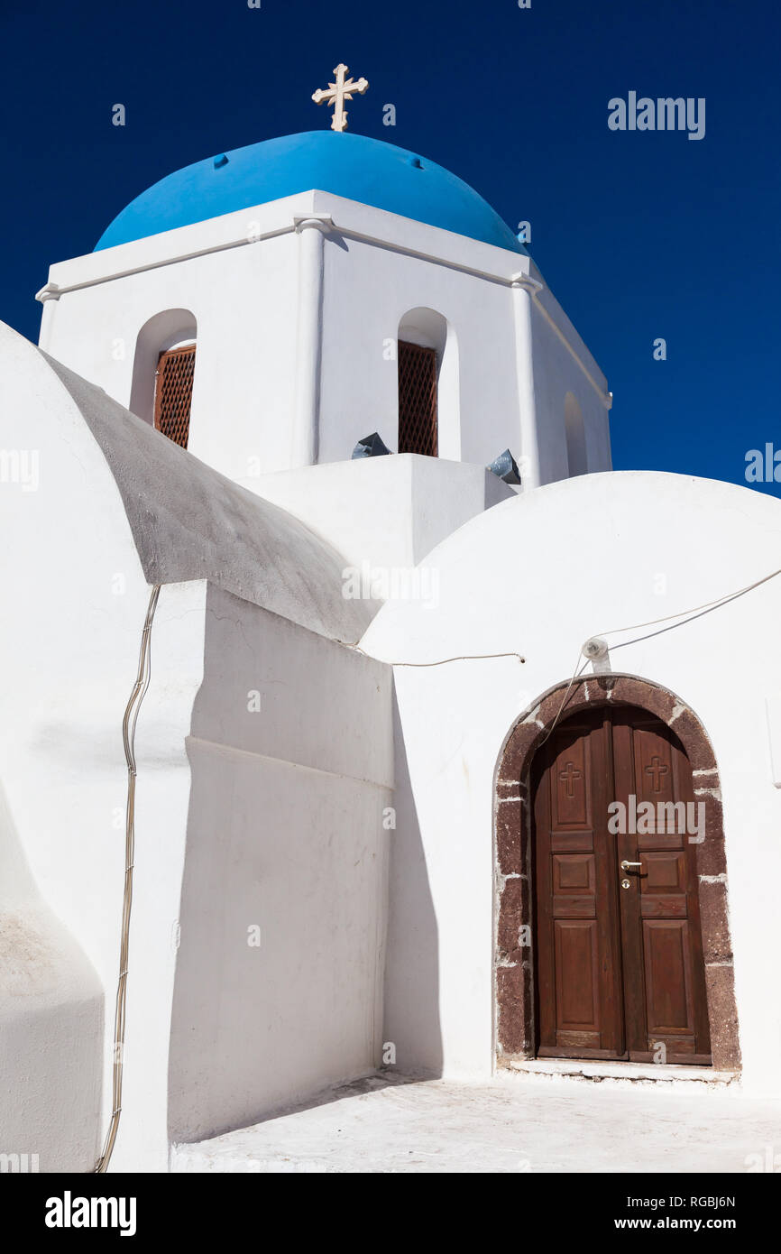 Houses and architecture in white and blue on Santorin, Greece, a very popular cruise boat stop in the Mediterranean Sea Stock Photo