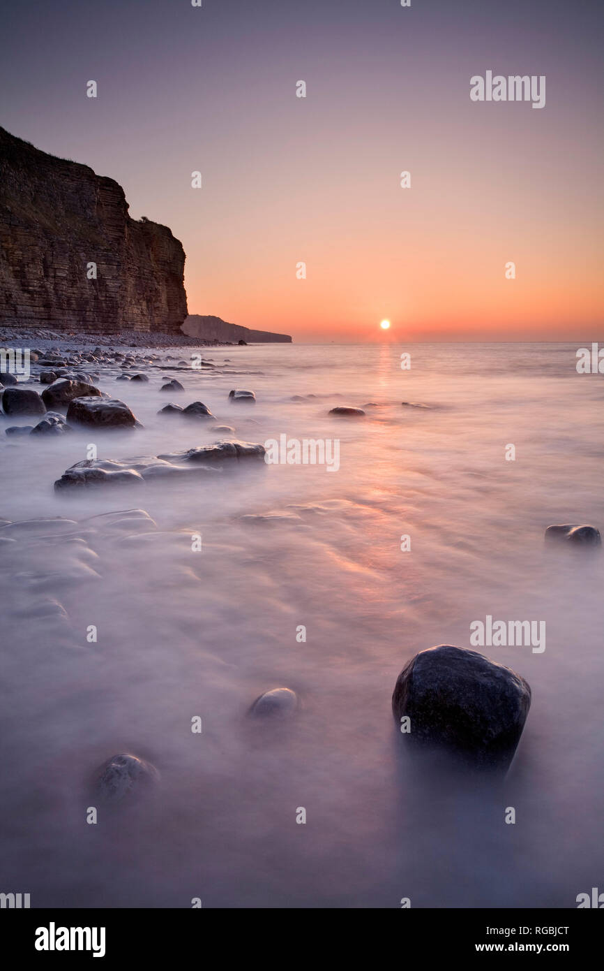 The beach at Llantwit Major at sunrise, Vale of Glamorgan, Glamorgan Coast, Wales Stock Photo