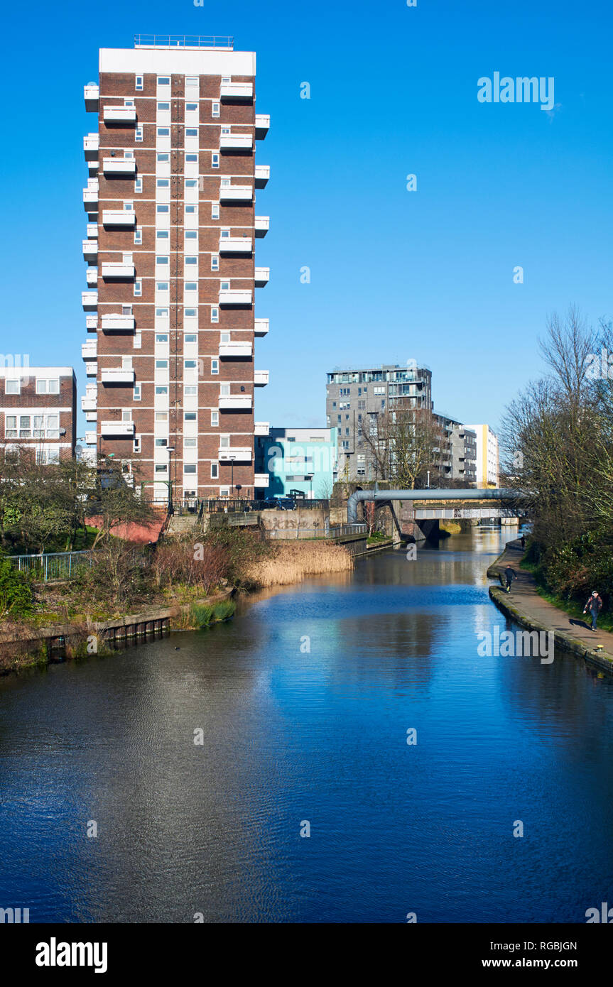 Tower block beside the Regents Canal at Limehouse, in London's East End, UK Stock Photo