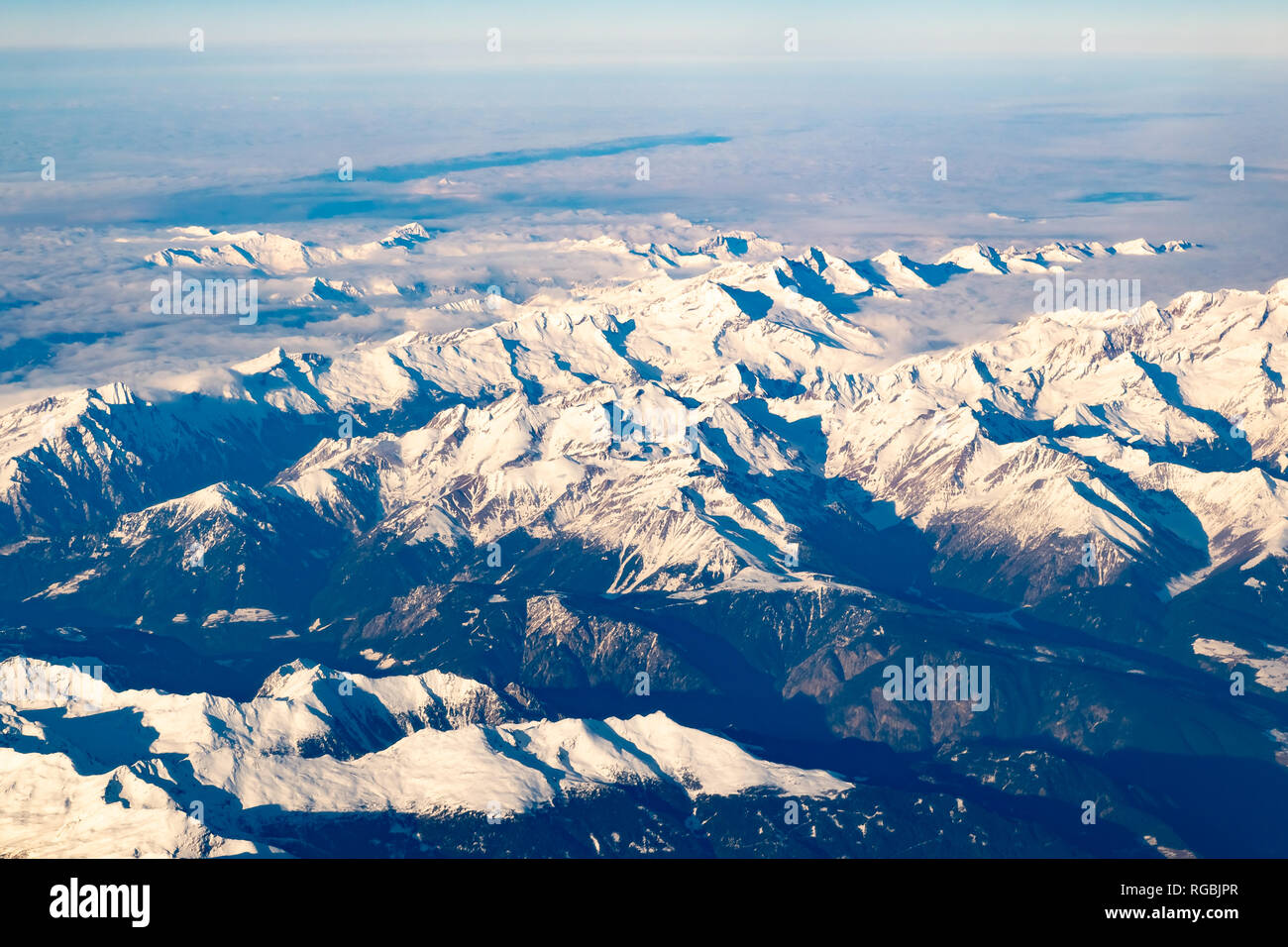 Swiss, Italy and Austrian Alps with snowy mountain tops aerial view ...