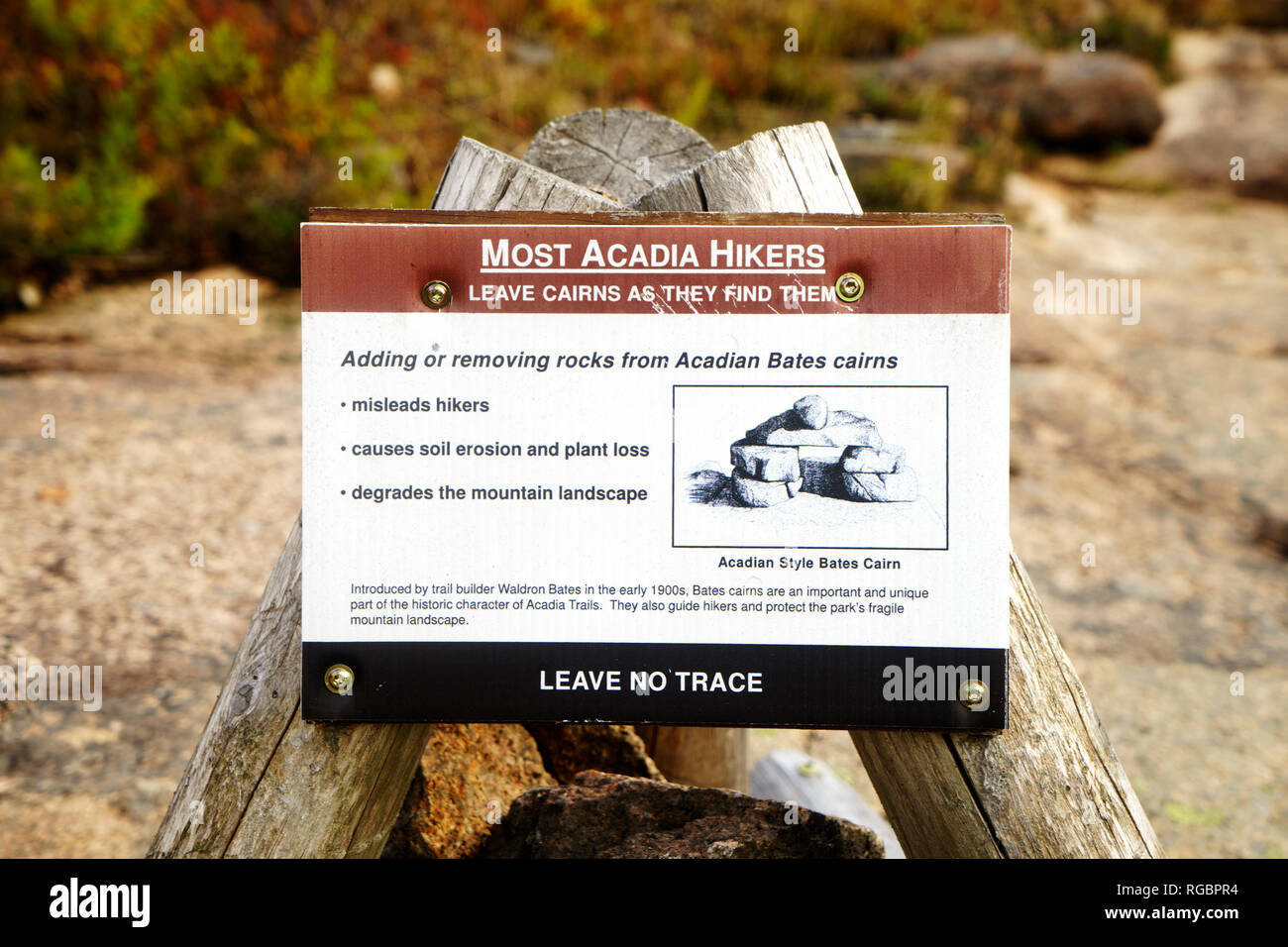 Sign warning hikers to leave Acadian Bates cairns as they find them.Acadia National Park, Maine, USA. Stock Photo
