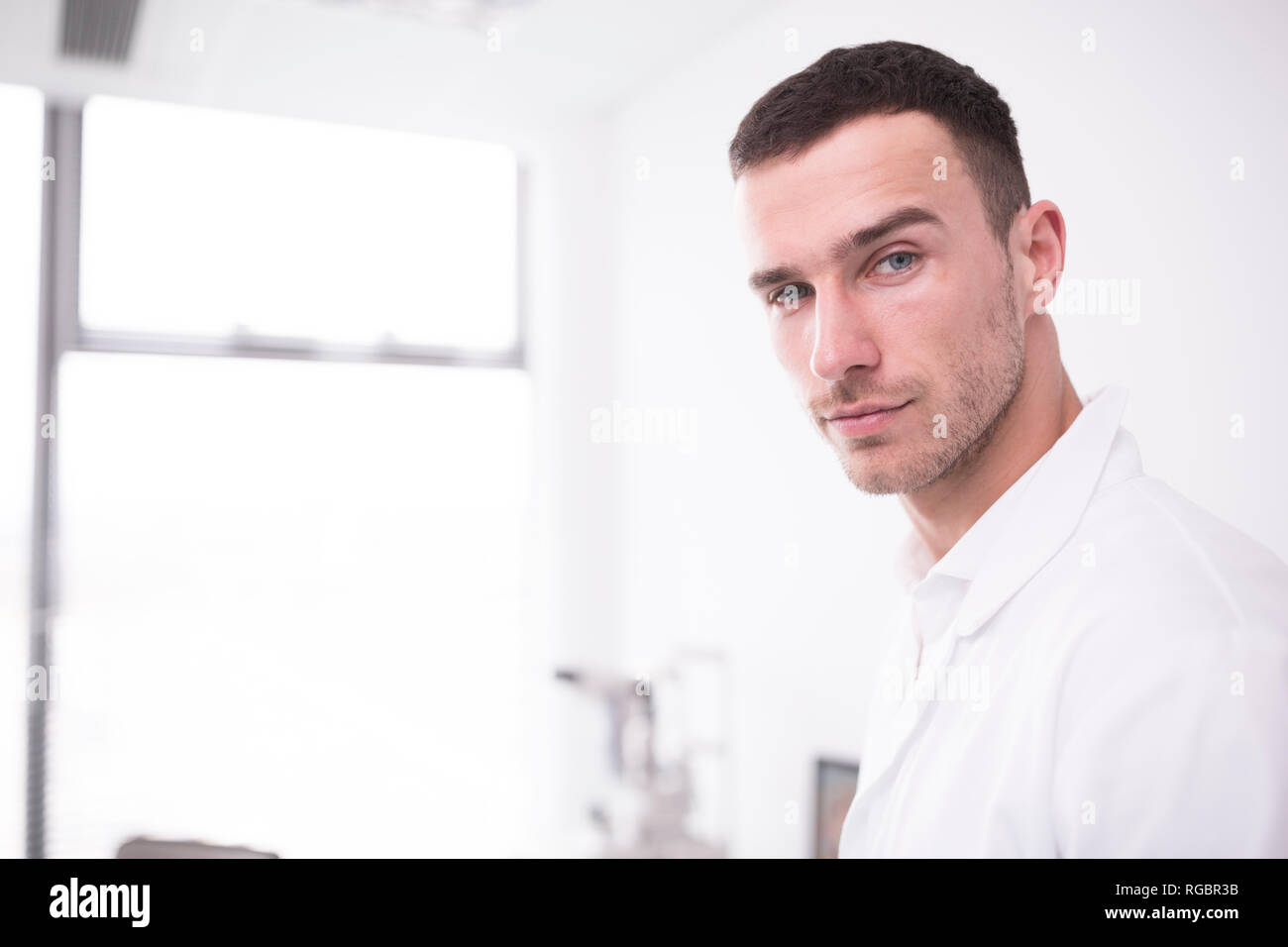 Portrait of confident scientist in lab Stock Photo