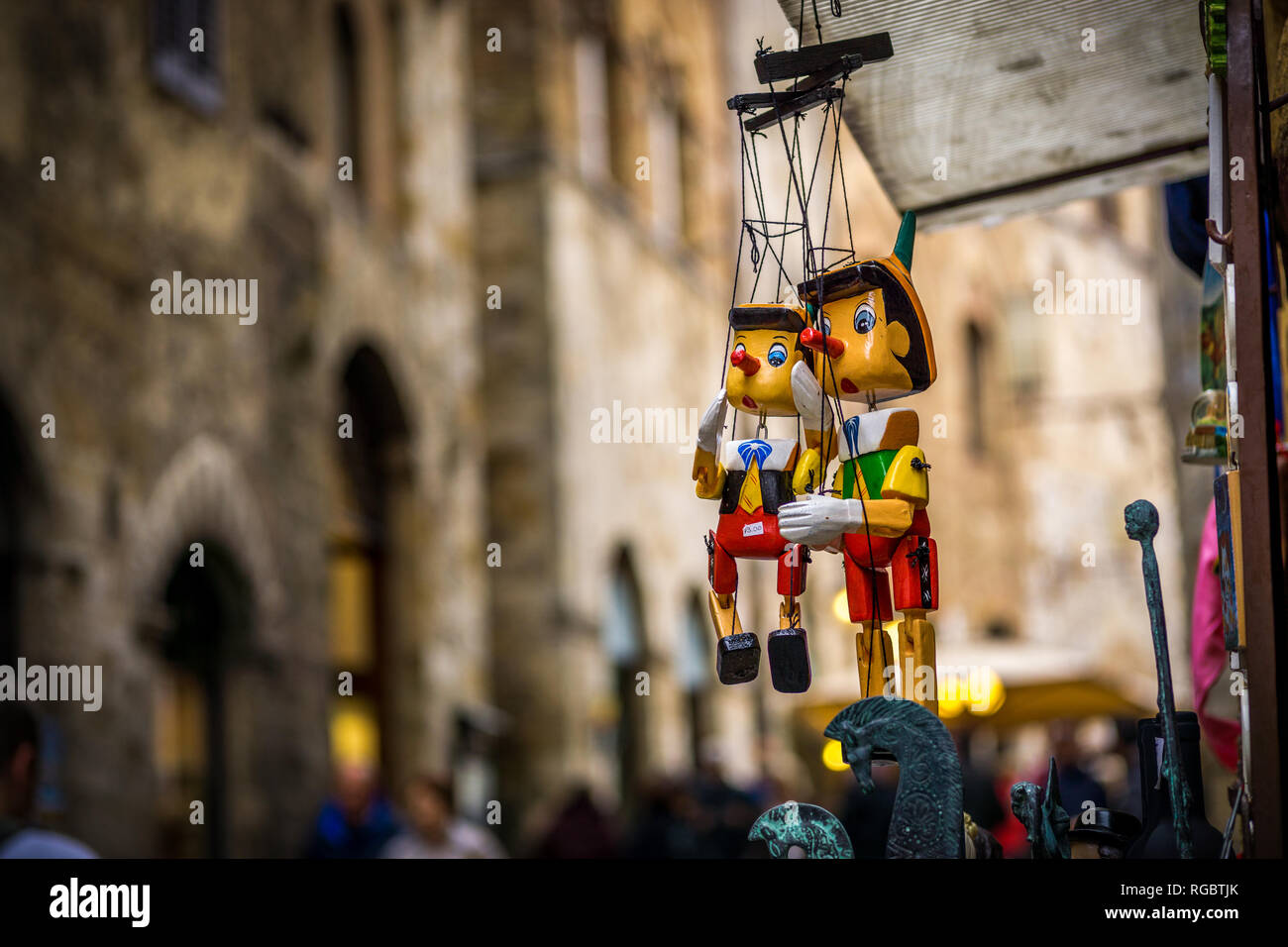 Colourful wooden Pinocchio marionettes, Tuscany, Italy Stock Photo