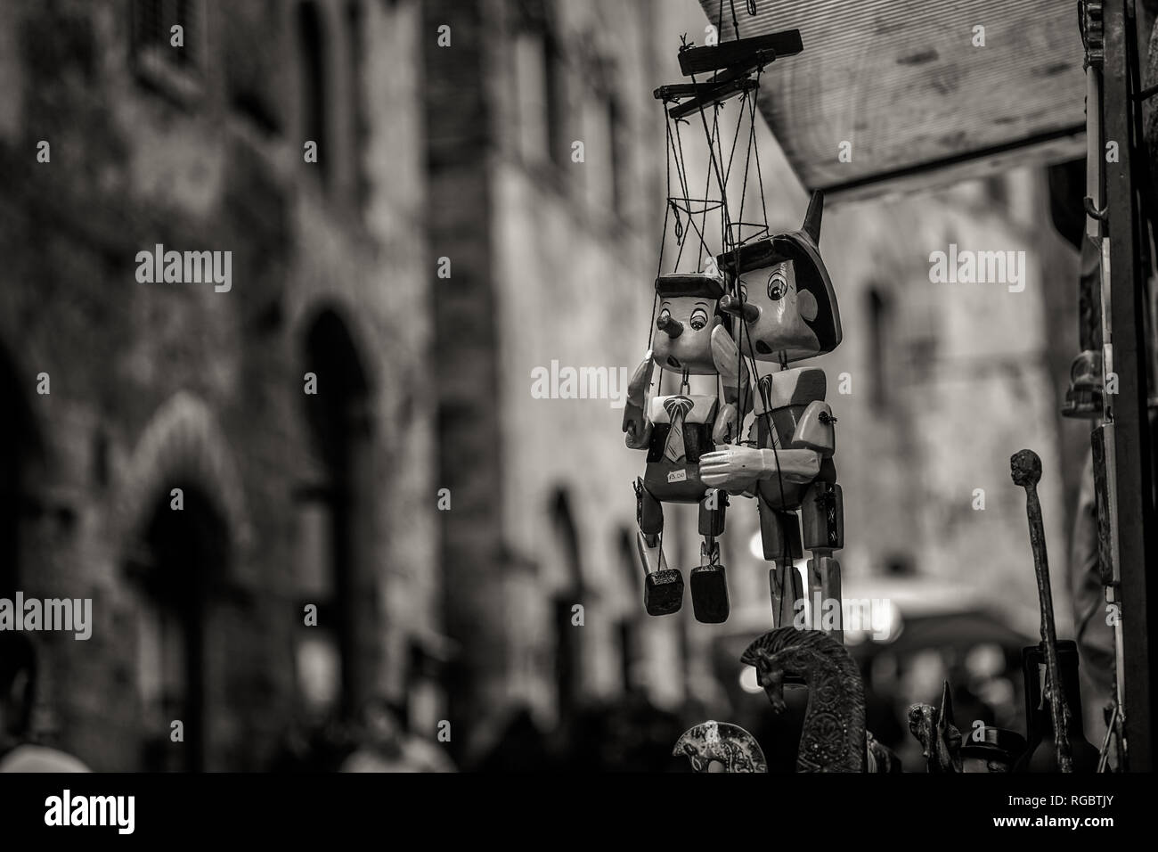 Wooden Pinocchio marionettes Stock Photo