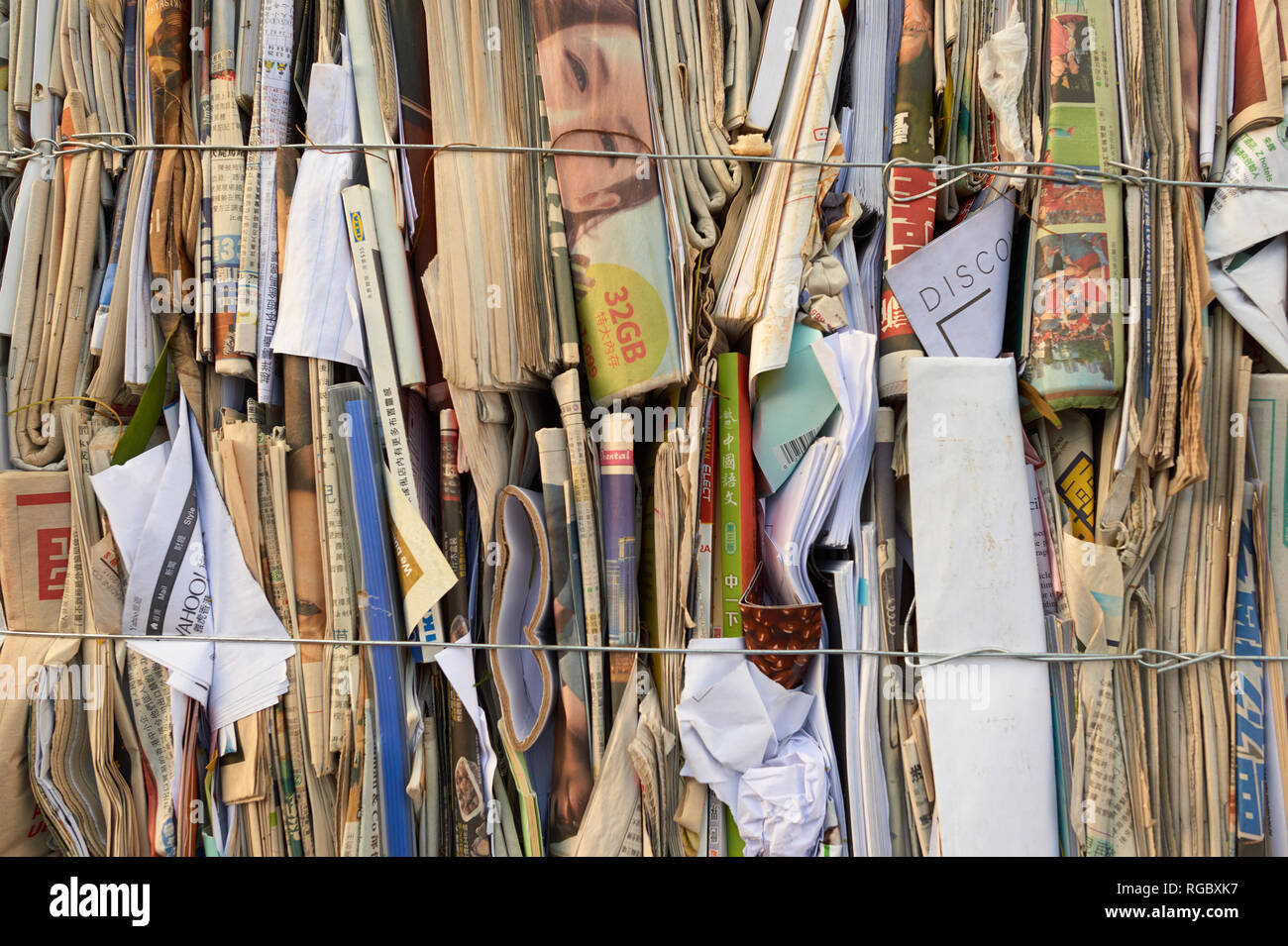 Chinese Paper Stack HONG KONG - OCTOBER 25, 2015: close up shot of stacks of paper for ...