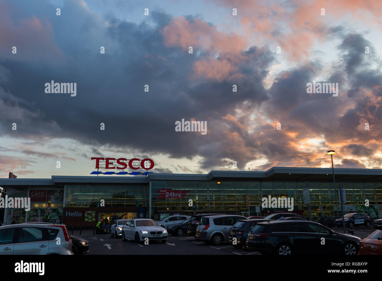 Sunset over Tesco's 24 hour store, Lisburn, N.Ireland. Stock Photo