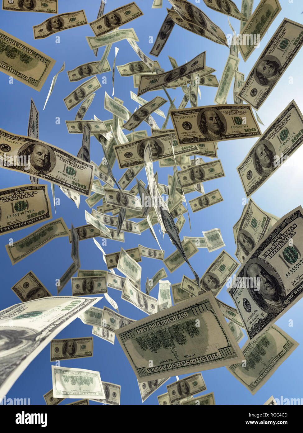 3D render of bunch of American 100 dollar bills falling down from the sky Stock Photo