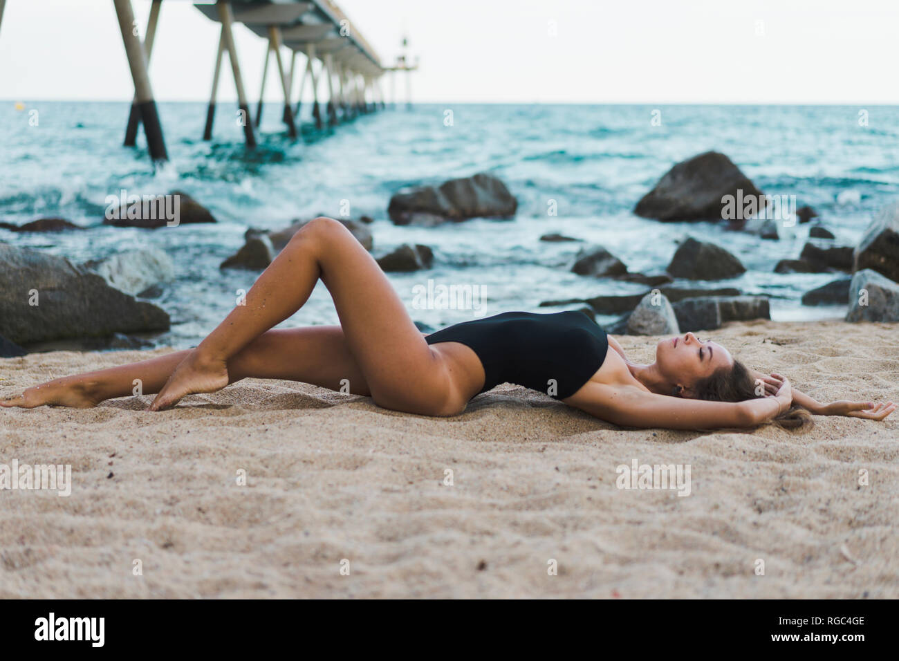 Beautiful young woman wearing swimsuit hi-res stock photography