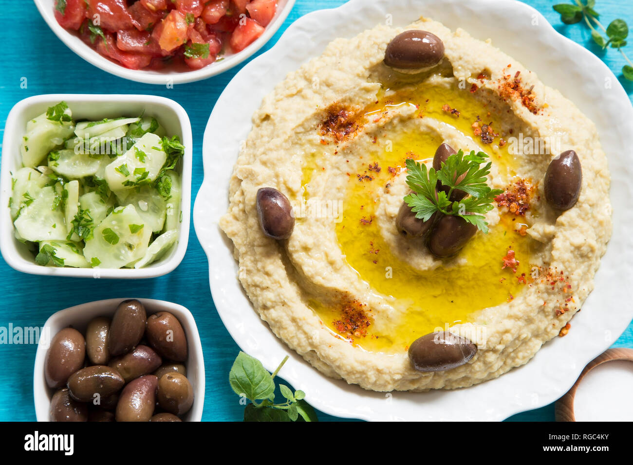 Traditional hummus with the fresh sald Stock Photo