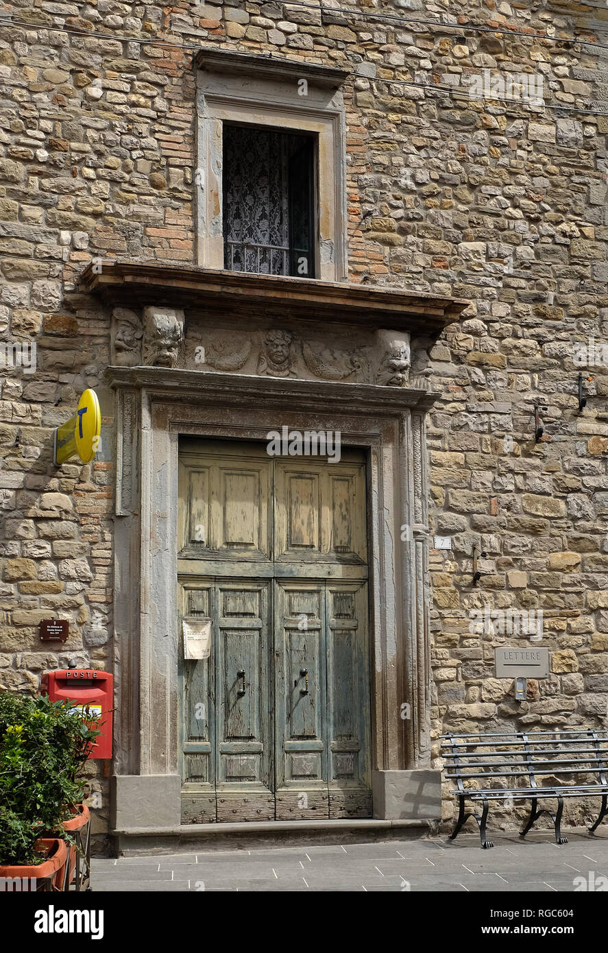Post Office Door And Window In Piazza Fortebraccio Umbria Italy