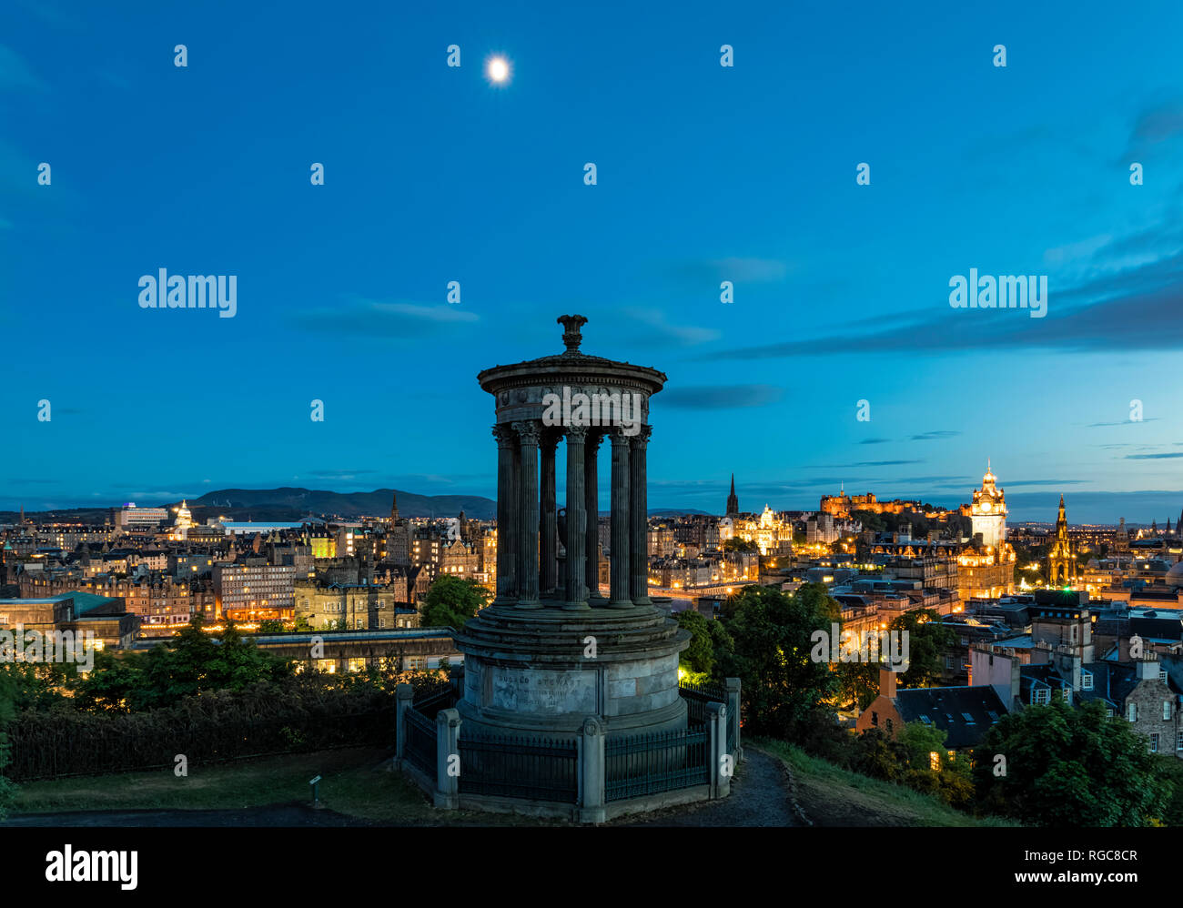 Great Britain, Scotland, Edinburgh, View from Calton Hill with Dugald Stewart Monument, cityscape of old town with castle and Balmoral Hotel Stock Photo