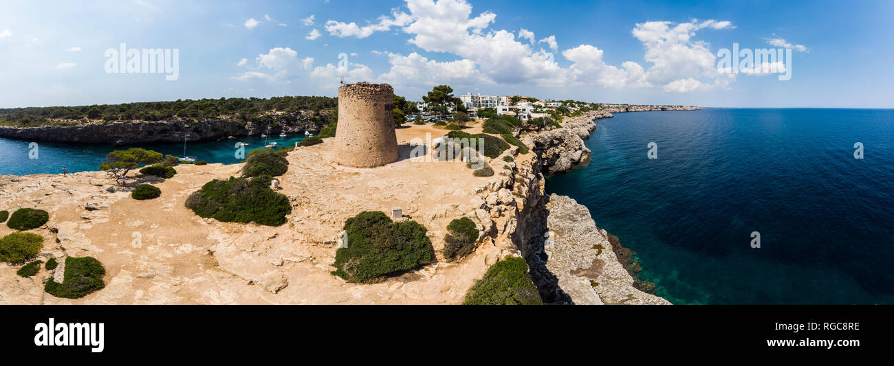 Spain, Balearic Islands, Mallorca, Llucmajor, Aerial view of bay of Cala Pi and Torre de Cala Pi Stock Photo