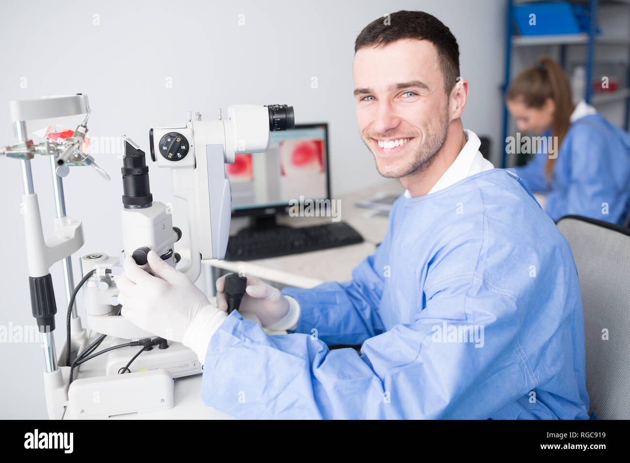 Portrait of smiling lab technician in lab Stock Photo