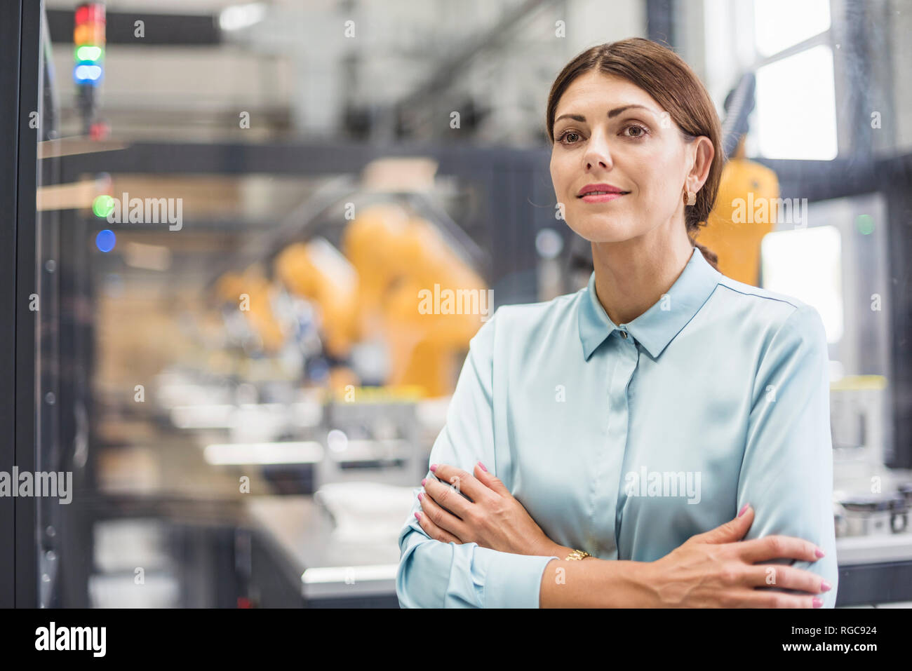 Businesswoman working in high tech company, portrait Stock Photo