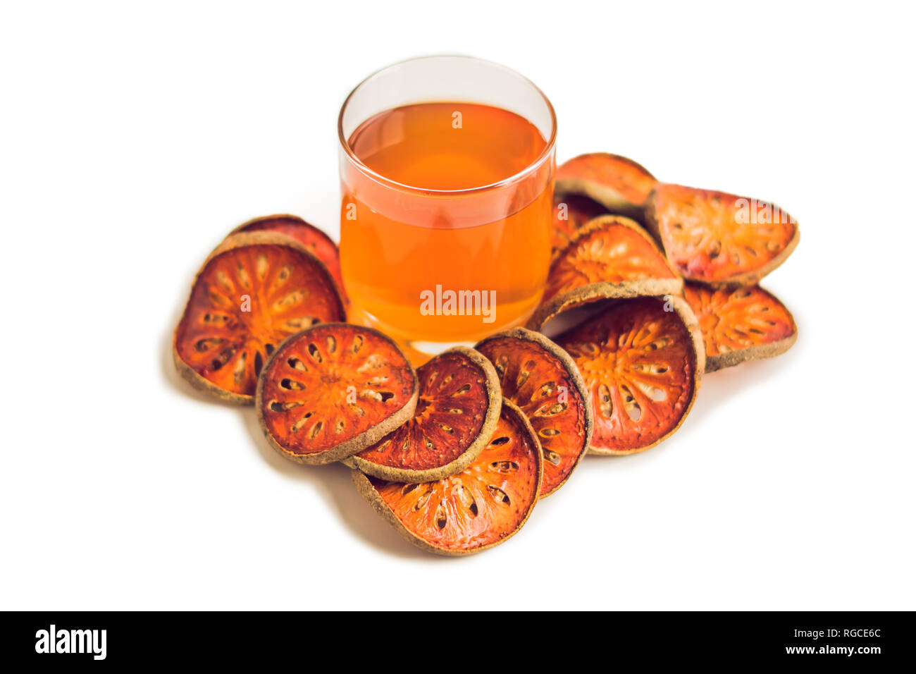 Bael fruit tea and slices of dried bael fruit, tea matum isolated on white Stock Photo Alamy