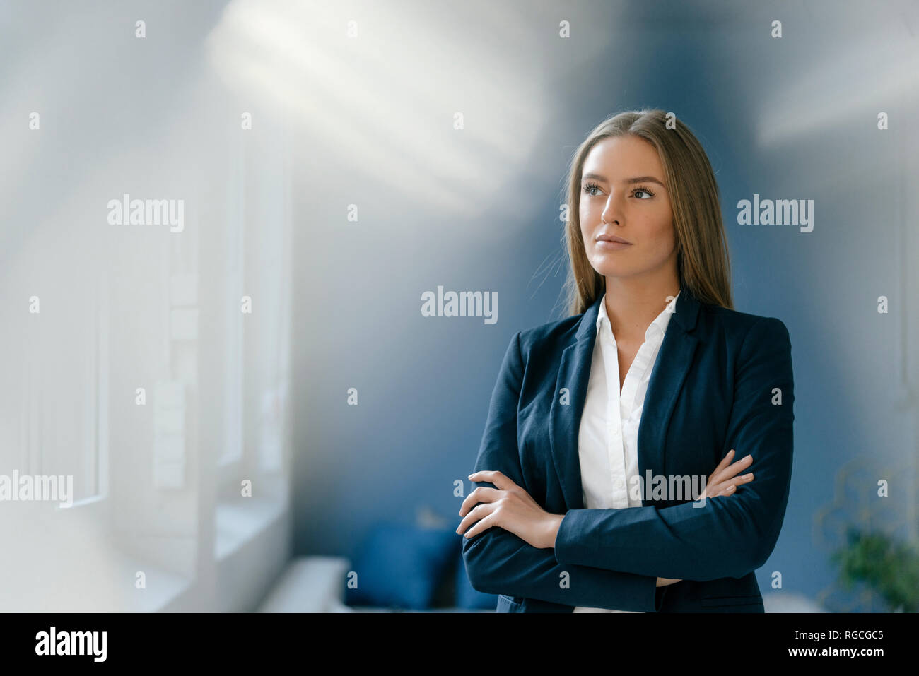 Serious longhair businesswoman arms hi-res stock photography and images ...