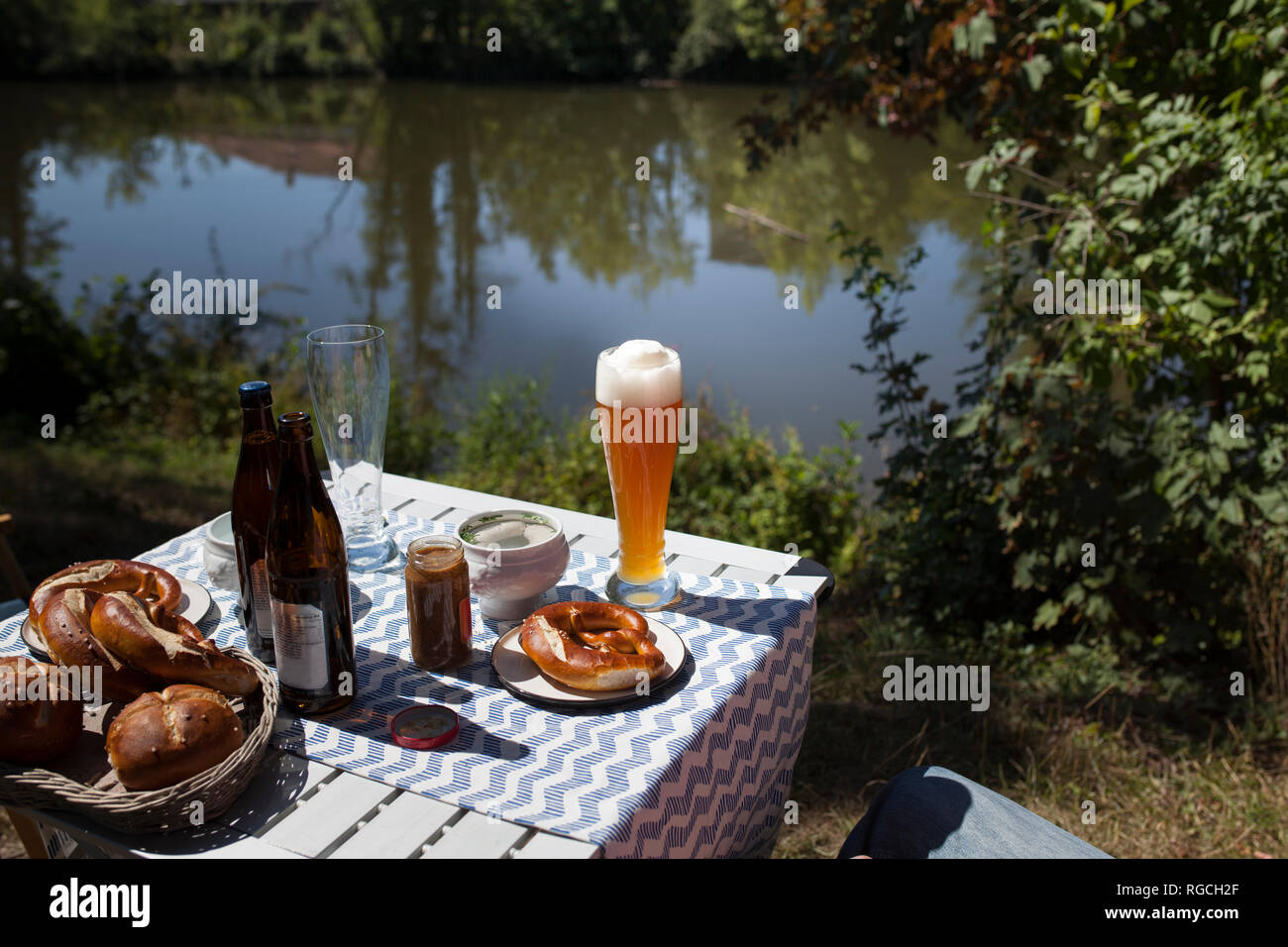 Breakfast with Bavarian veal sausage, wheat beer and pretzls Stock Photo