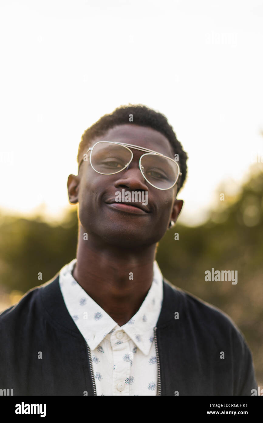 Portrait of a young black man, wearing a glasses Stock Photo